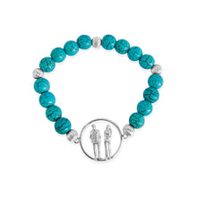 Load image into Gallery viewer, Turquoise Couple Charm Bracelet featuring vibrant reconstituted turquoise beads, a delicate sterling silver couple charm from the Circle of Life collection.
