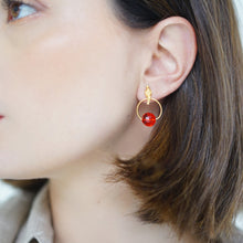 Load image into Gallery viewer, Handcrafted Allure Circle of Life Stud Earrings in 18k gold-plated metal with sparkling crystal beads in a modern circular design, available in different colors. Crystal in Red.