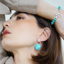 Load image into Gallery viewer, Turquoise Heart Drop Earrings and Turquoise Couple Charm Bracelet featuring vibrant reconstituted turquoise beads, a delicate sterling silver couple charm from the Circle of Life collection.