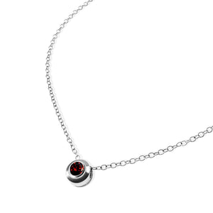 NATAL Birthstone Necklace for January with a dark-red crystal inspired by Garnet, set in a 7mm sterling silver charm on a fine adjustable silver chain.