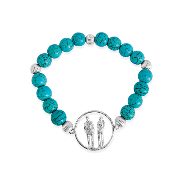 Turquoise Couple Charm Bracelet featuring vibrant reconstituted turquoise beads, a delicate sterling silver couple charm from the Circle of Life collection.