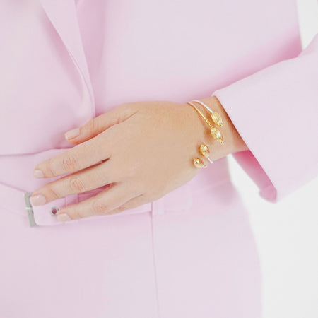 Seed Cuff Bracelet in Mixed Metal, handcrafted in sterling silver with an 18K gold-plated seed detail, featuring an open design symbolizing growth and new beginnings.