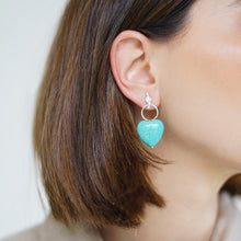 Load image into Gallery viewer, Handcrafted Turquoise Heart Drop Earrings featuring heart-shaped turquoise stones made in sterling silver.
