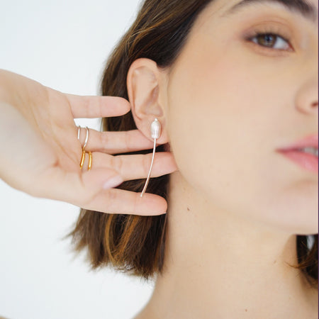 Handcrafted Root of Life Drop Earrings in Sterling Silver. Elegant drop design featuring a textured stem and seed, symbolizing nature and new beginnings.