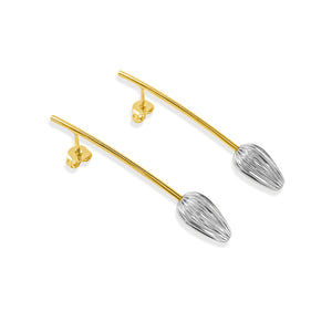 Seed Drop Earrings in Mixed Metal, featuring a sleek, seed-inspired design with a blend of sterling silver and 18k gold-plated accents. Elegant and bold, these earrings symbolize growth and renewal.