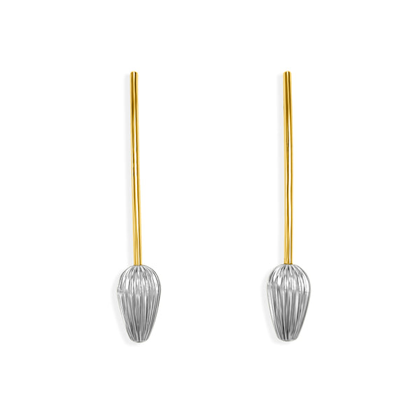Seed Drop Earrings in Mixed Metal, featuring a sleek, seed-inspired design with a blend of sterling silver and 18k gold-plated accents. Elegant and bold, these earrings symbolize growth and renewal.