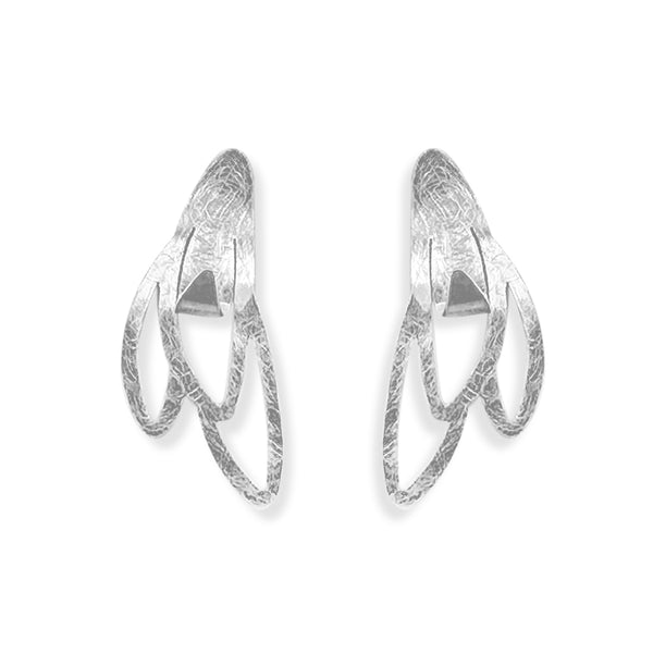 Handcrafted Vera Stud Earrings in sterling silver, featuring a delicate design of seeds beginning to bloom, symbolizing new beginnings and growth, with a modern, elegant aesthetic.