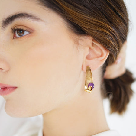 Handmade Maia Amethyst Drop Earrings featuring radiant purple gemstones gracefully wrapped in 18k Gold Plated over Sterling Silver lines and textures, creating a refined and elegant design.
