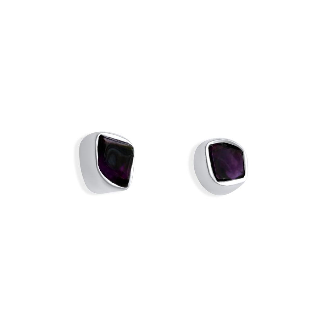 Amethyst Mini Stud Earrings made with natural amethyst stones in organic shapes set in sterling silver, highlighting their unique and exclusive design.