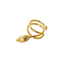 Cargar imagen en el visor de la galería, Handcrafted Seed Cocktail Ring in 18k gold plated, showcasing an elegant, fluid design that wraps around the finger and ends in an organic seed shape, symbolizing new beginnings and growth.
