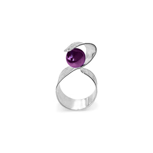 Handmade Maia Amethyst Ring featuring a radiant purple gemstone gracefully wrapped in sterling silver lines, creating a modern and sophisticated design.