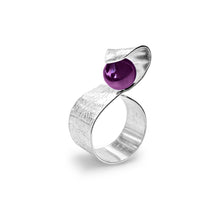 Load image into Gallery viewer, Handmade Maia Amethyst Ring featuring a radiant purple gemstone gracefully wrapped in sterling silver lines, creating a modern and sophisticated design.
