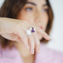 Load image into Gallery viewer, Handmade Maia Amethyst Ring featuring a radiant purple gemstone gracefully wrapped in sterling silver lines, creating a modern and sophisticated design.
