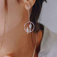 Load image into Gallery viewer, Circle Long Drop Earrings in Silver with couple together
